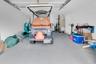 Wide One Car Garage w/ Plenty of Storage