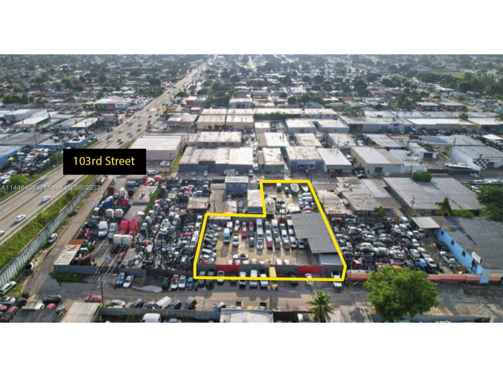 The property is presently used as a used car sales lot.
