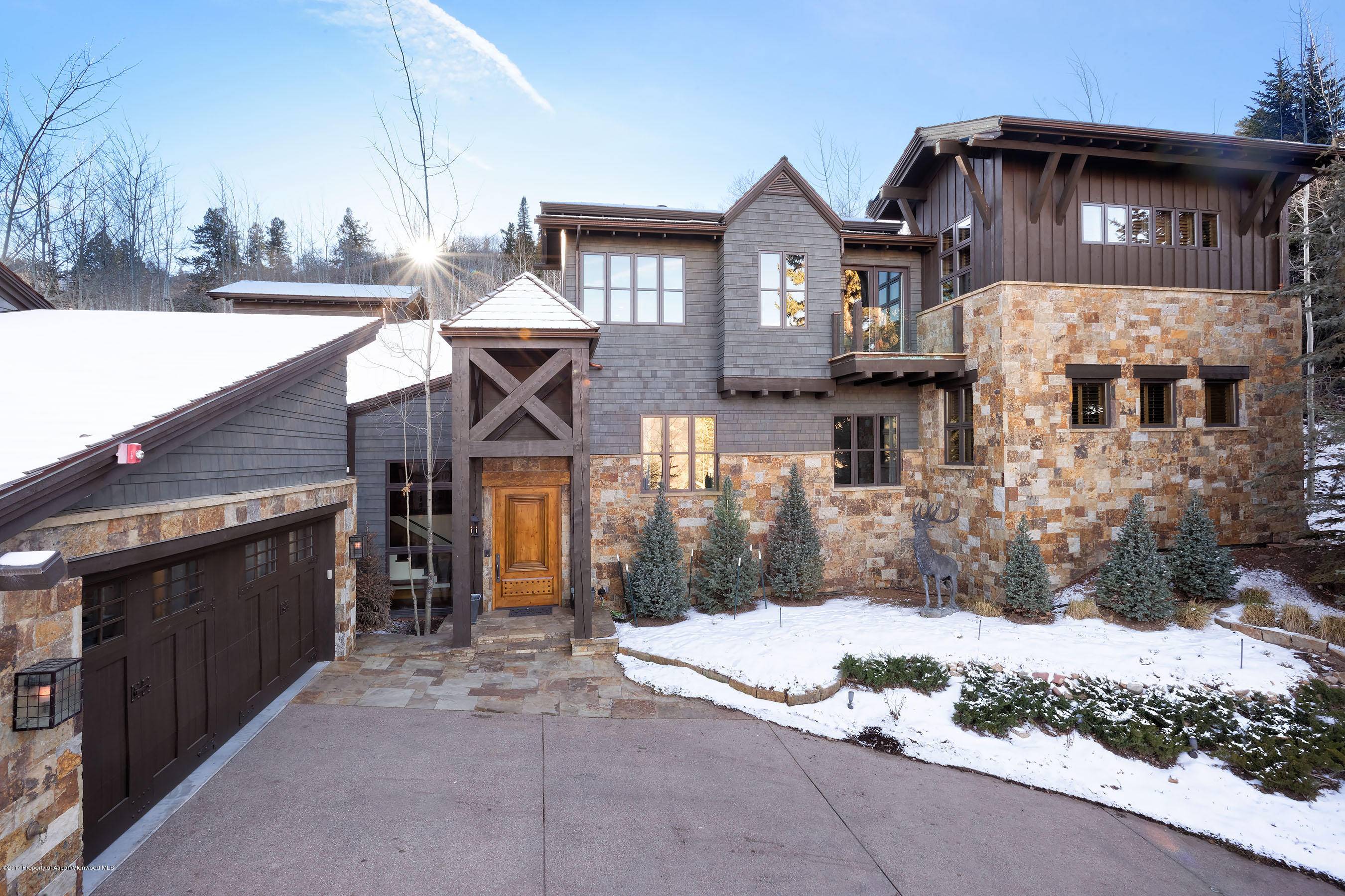 This beautiful estate boasts SKI ACCESS to and from Oregon Trail to ski Tiehack and Buttermilk.