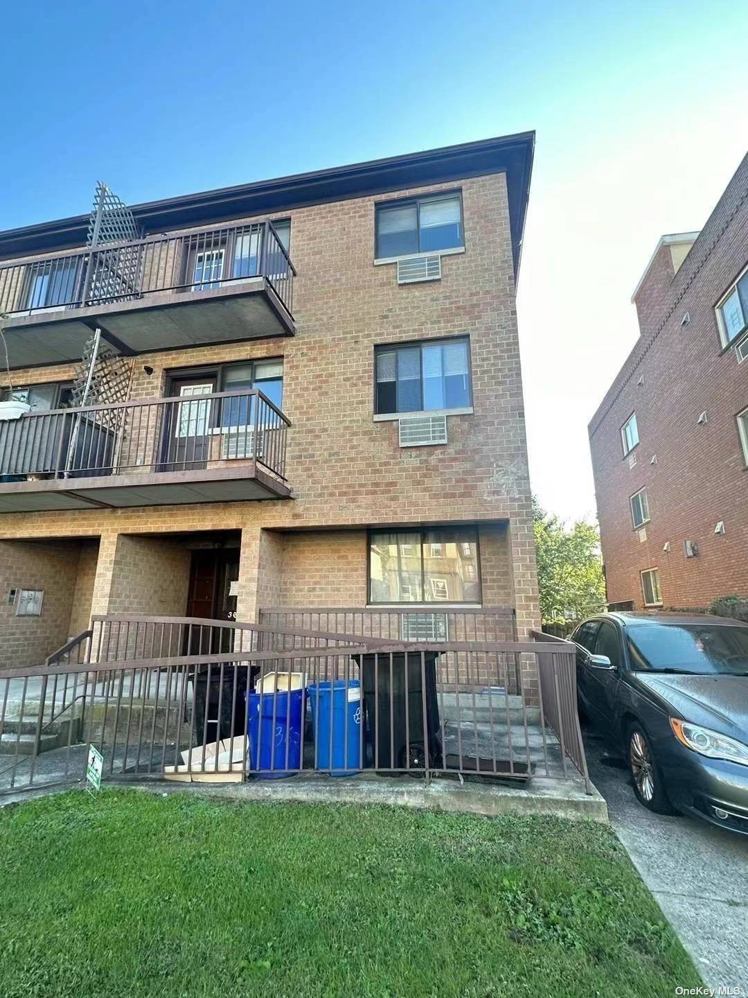 Beautiful Semi attached Brick legal 3 family at the desirable area in Murray Hill, Flushing.