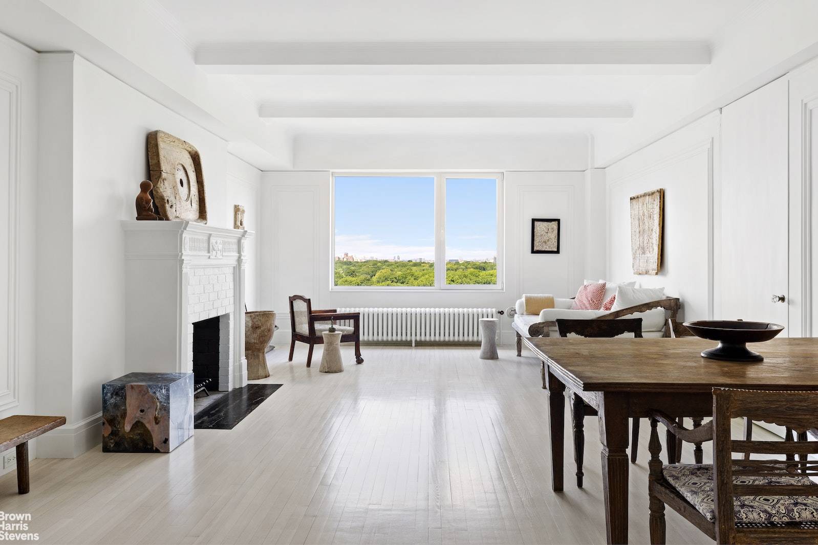 This mint and meticulously renovated top floor residence floats high above Central Park in a fully serviced pre war limestone building and offers superb finishes and mesmerizing center park views ...