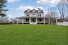 View of front of property with a large porch