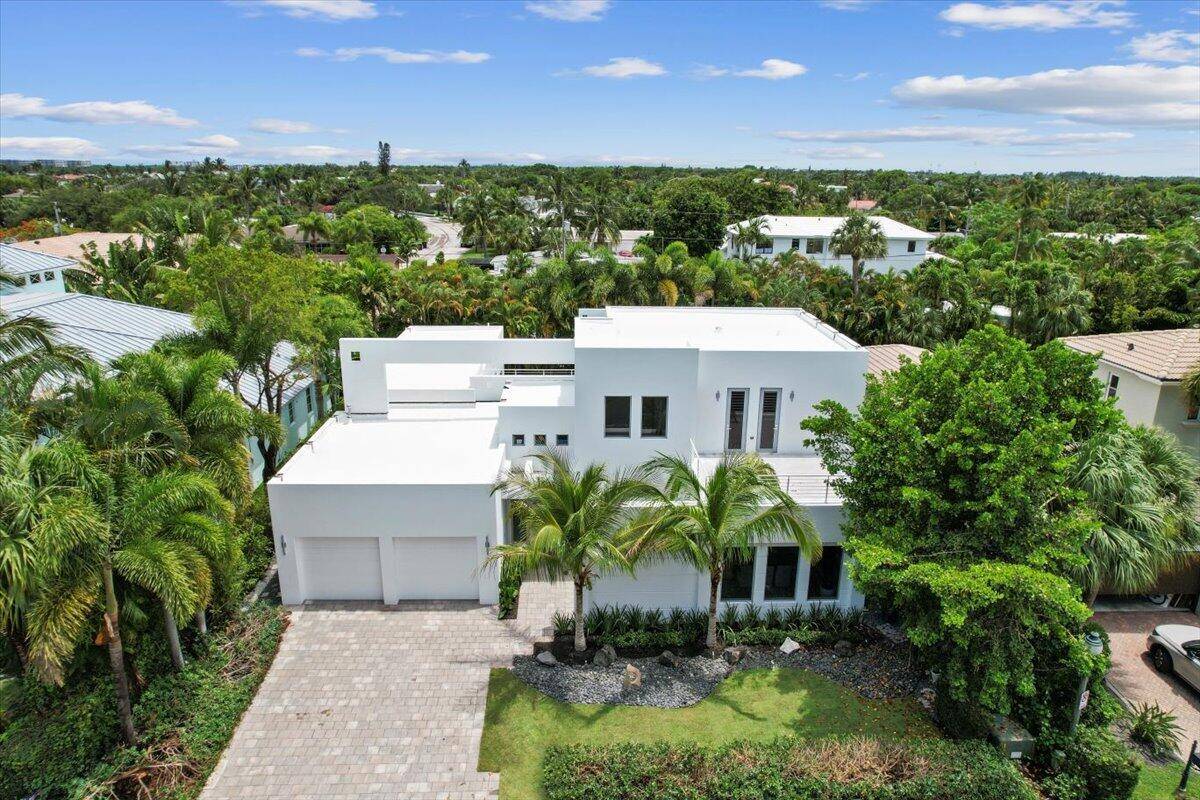 This newly designed modern home on one of SoSo's most exclusive streets, Palmetto Lane, is an entertainer's dream.