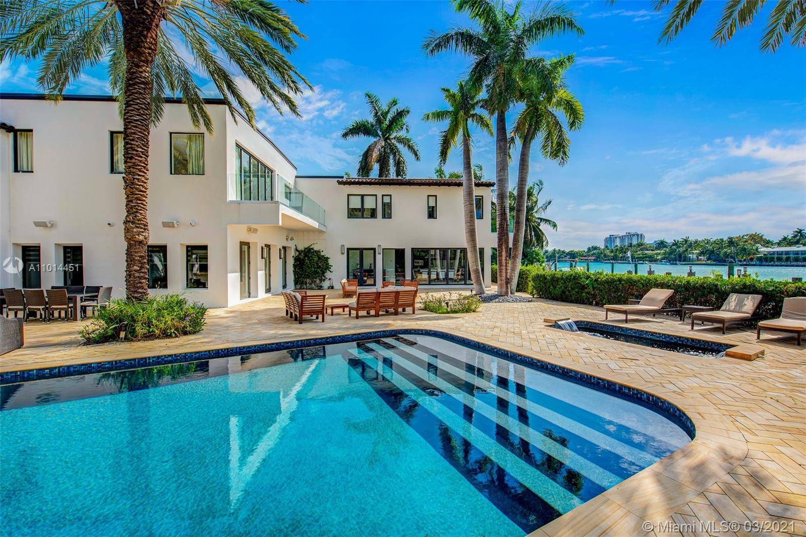 Architecturally stunning waterfront estate with open water views on the prestigious North Bay Road.