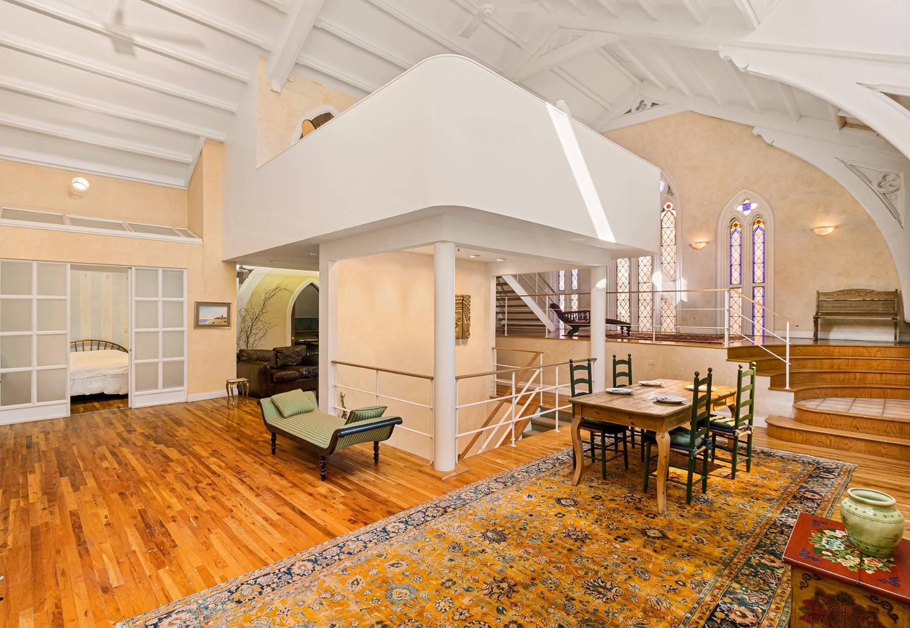 This dramatic, totally unique loft located in a converted gothic revival church circa 1850 offers enormous space approx.