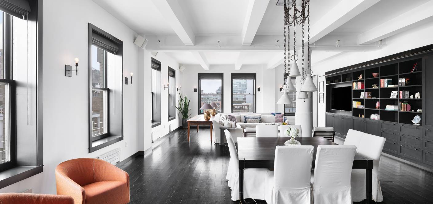 A duplex corner penthouse with views flooded with light that blends loft living glamour and apartment practicality.