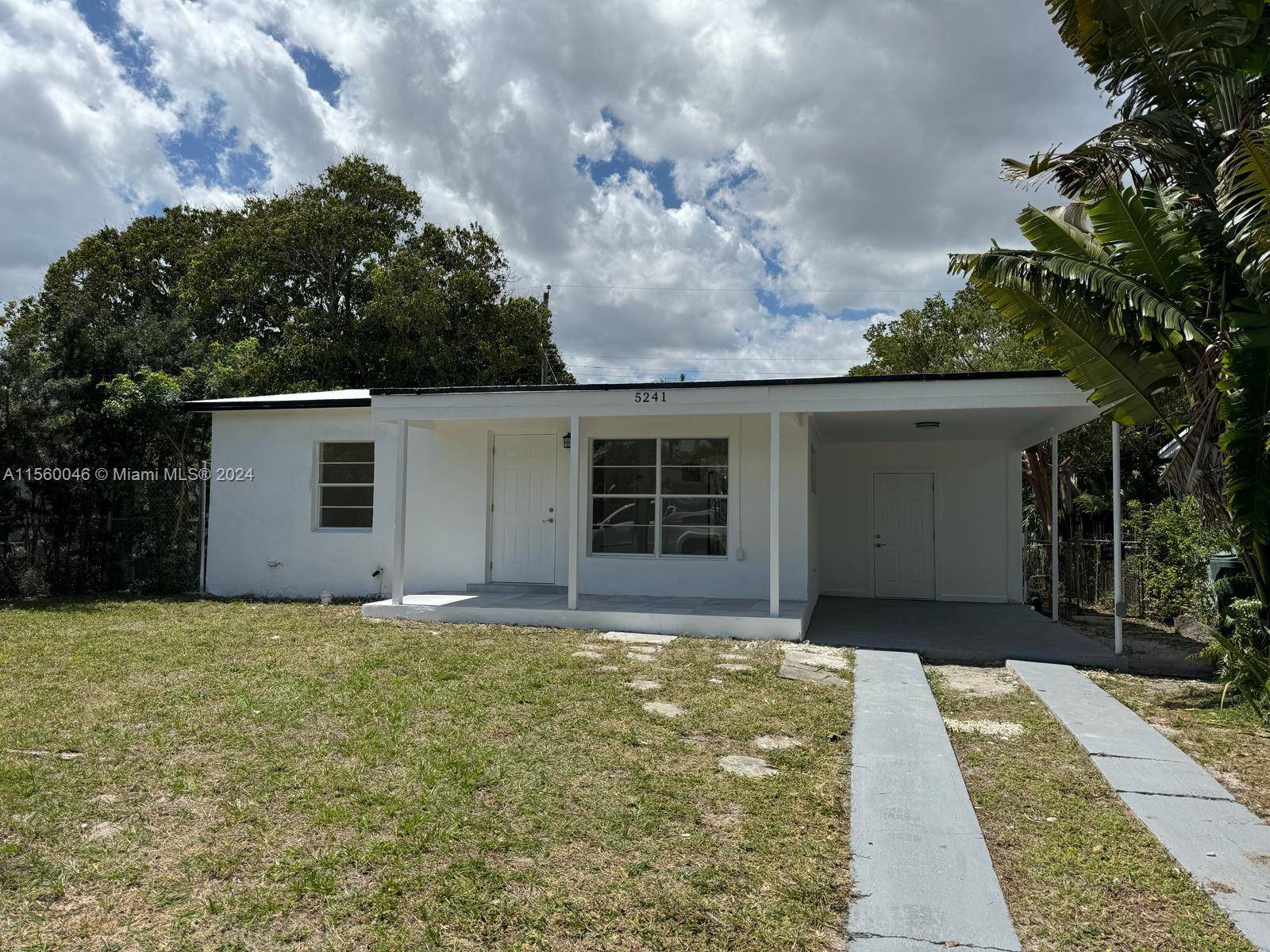 Centrally located remodeled 2 1 home with nice yard space.