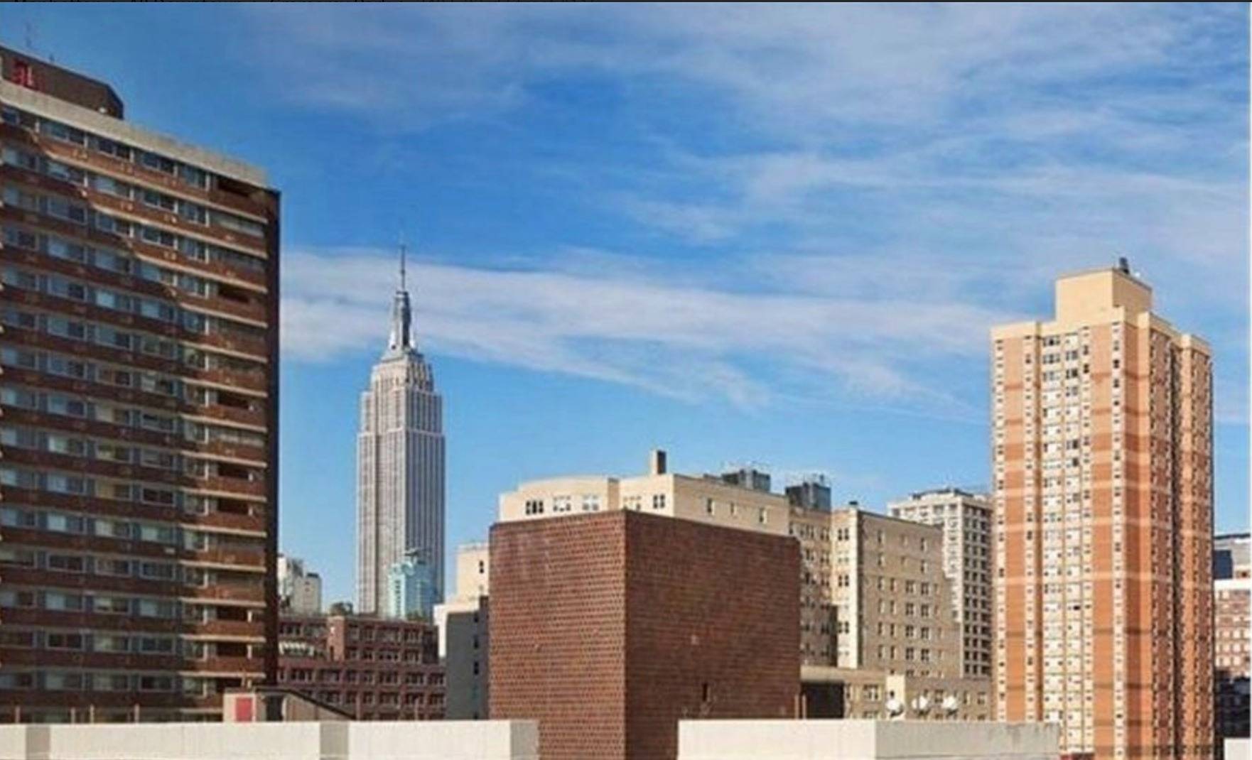 NO FEE ! Stunning studio designed by famous designer and architect, Philippe Starck features floor to ceiling windows with Empire State views !