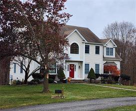 Welcome to this charming colonial home situated on an expansive 1.