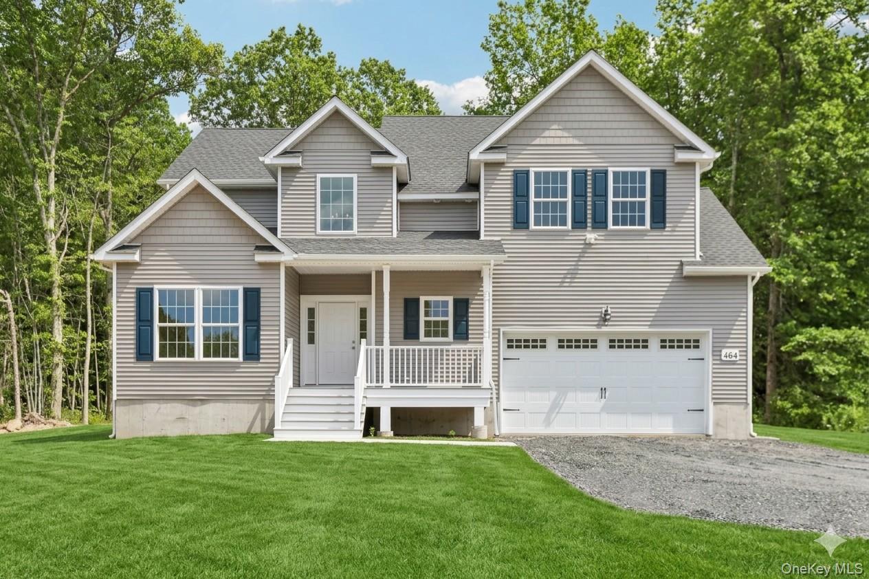 Beautiful colonial home. Lawn is an AI-generated rendering.