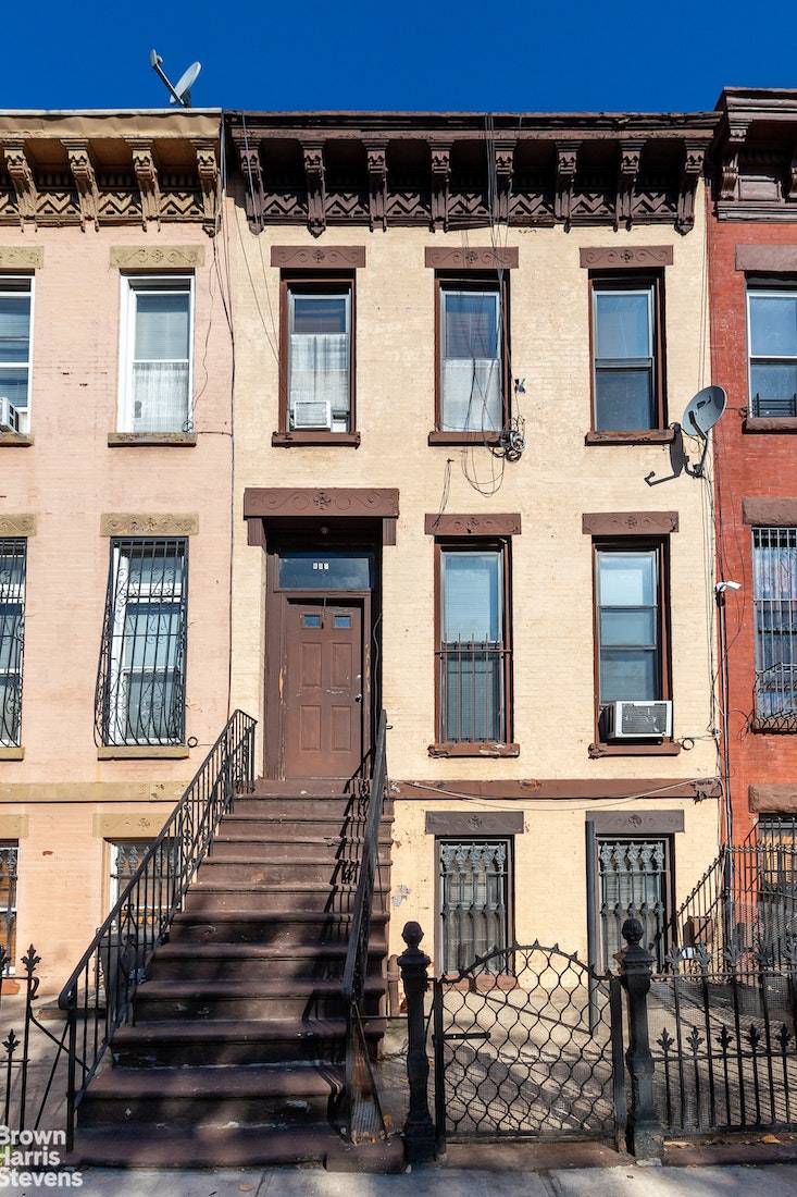 Retain the original facade and interior details fireplaces, banisters, moldings, pressed tin tiles, claw foot bathtubs or start fresh with this two family brick brownstone in Stuyvesant Heights within Brooklyn's ...