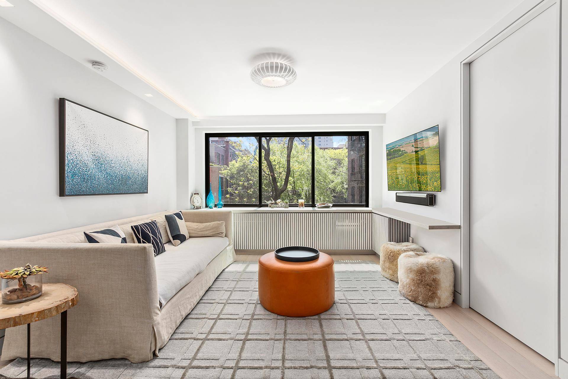 High end gut renovated three bedroom two bath condominium with full time doorman, picture perfect garden views and incredibly low monthlies at the crossroads of Greenwich Village and the West ...