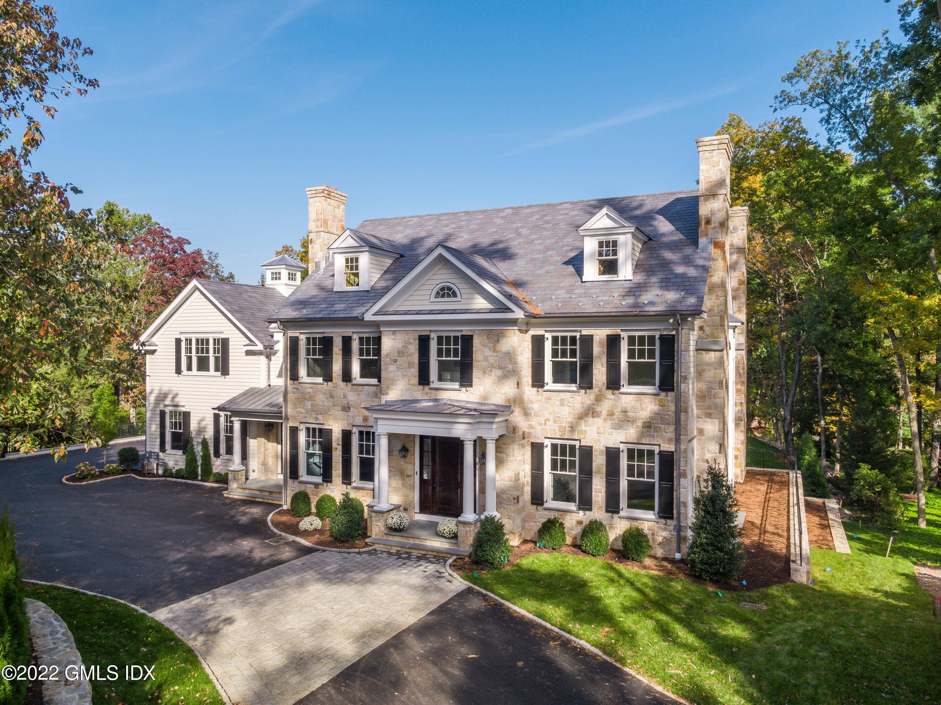 Exq newer construction Stone Clapboard Georgian Colonial w gorgeous pool spa in A mid country location.