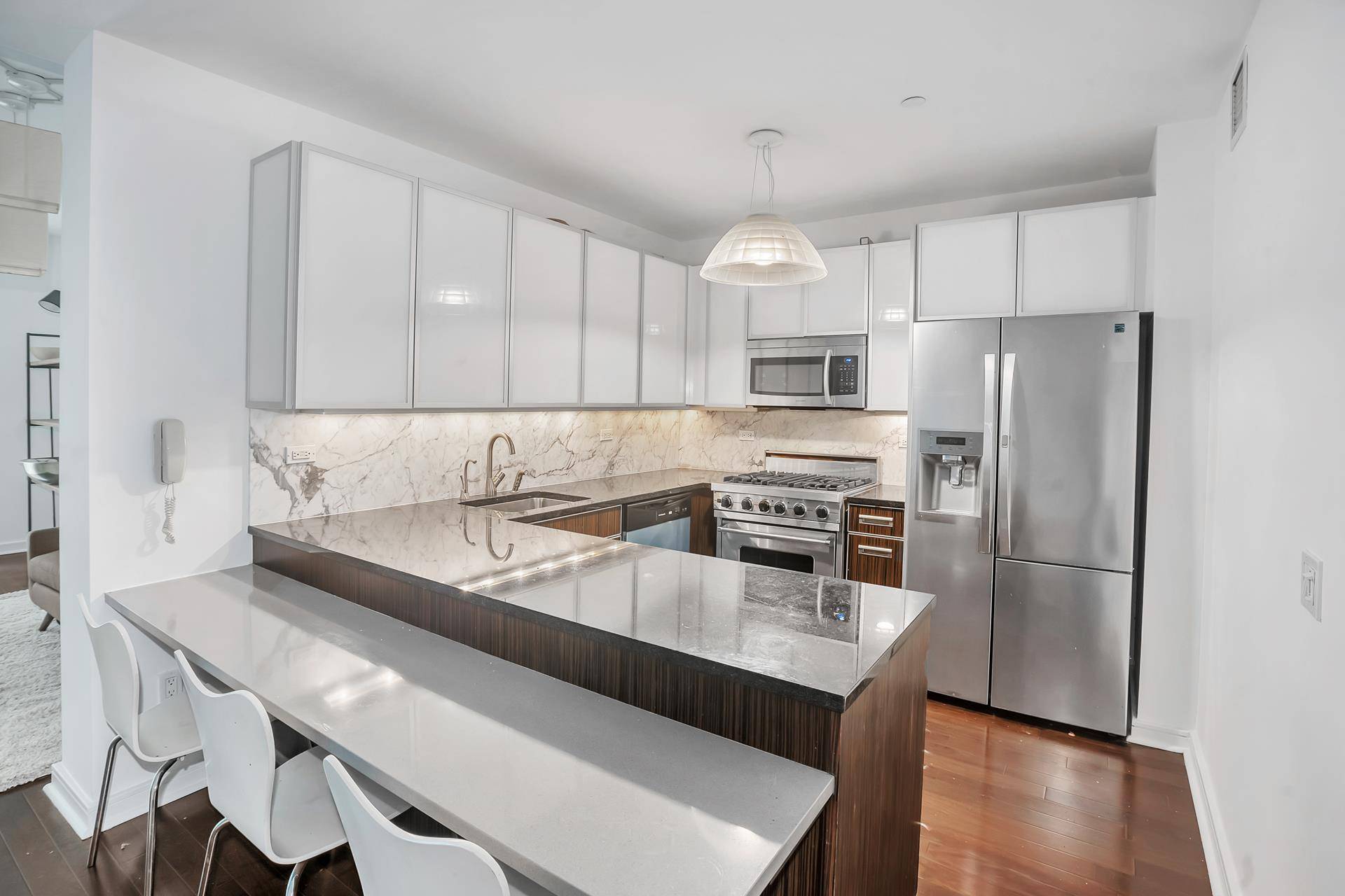 Presently utilized as a Two Bedroom 2BR Two Bathroom 2BA, with additional space for a Home Office, Apartment 4F at The Chelsea House, 130 West 19th Street, feels even larger ...