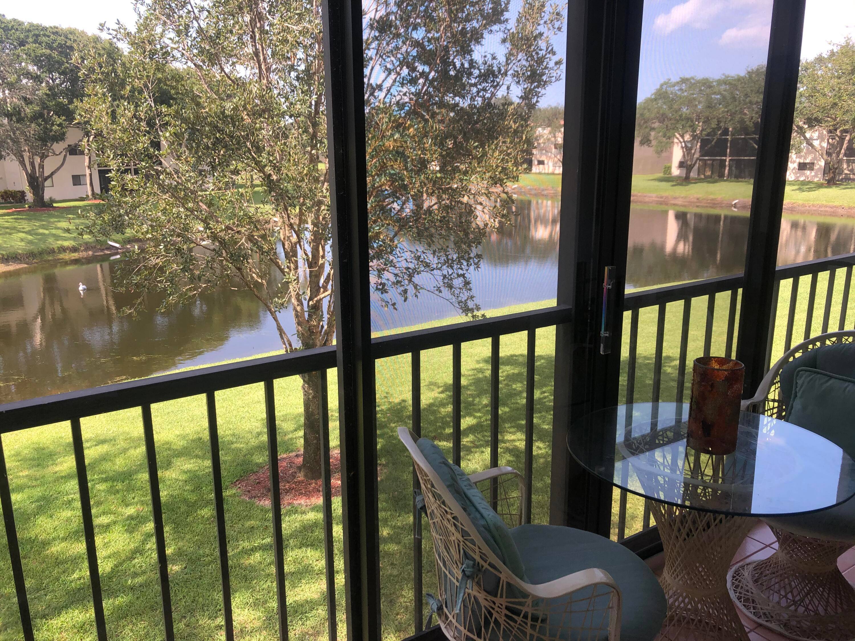 Enjoy beautiful lakeview from your enclosed patio.