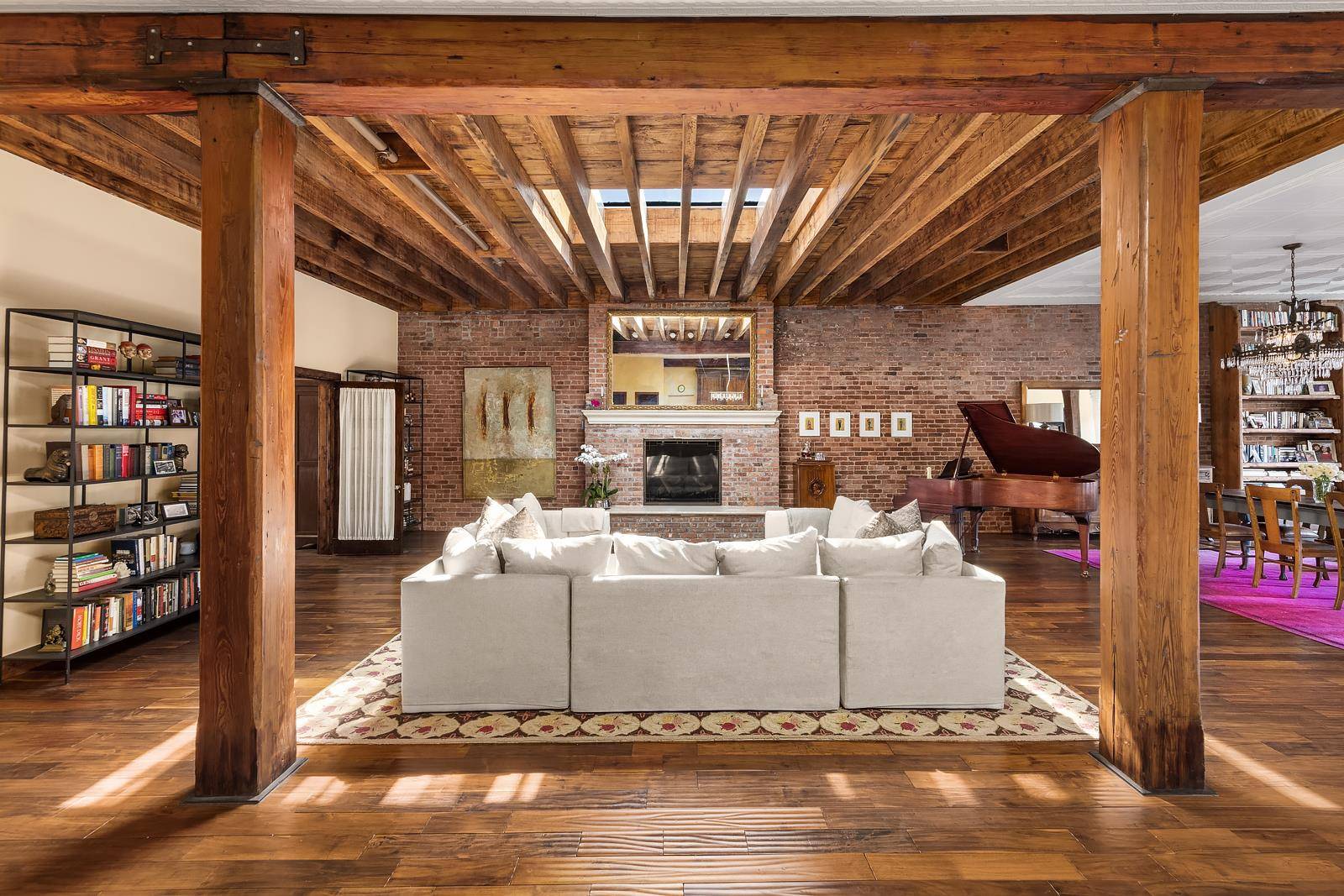 This one of a kind penthouse is a stunning 4 bedroom, 3 bath loft with private roof deck perched atop an intimate and historic Tribeca building.