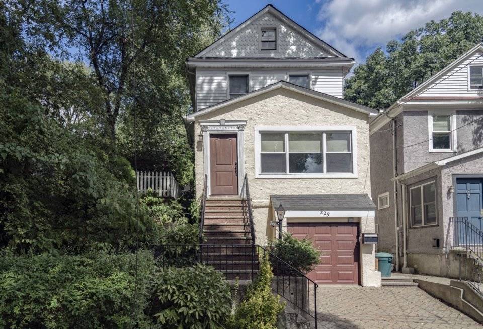 Completely renovated North Riverdale home with glorious garden and high end finishes ready for you to move in.