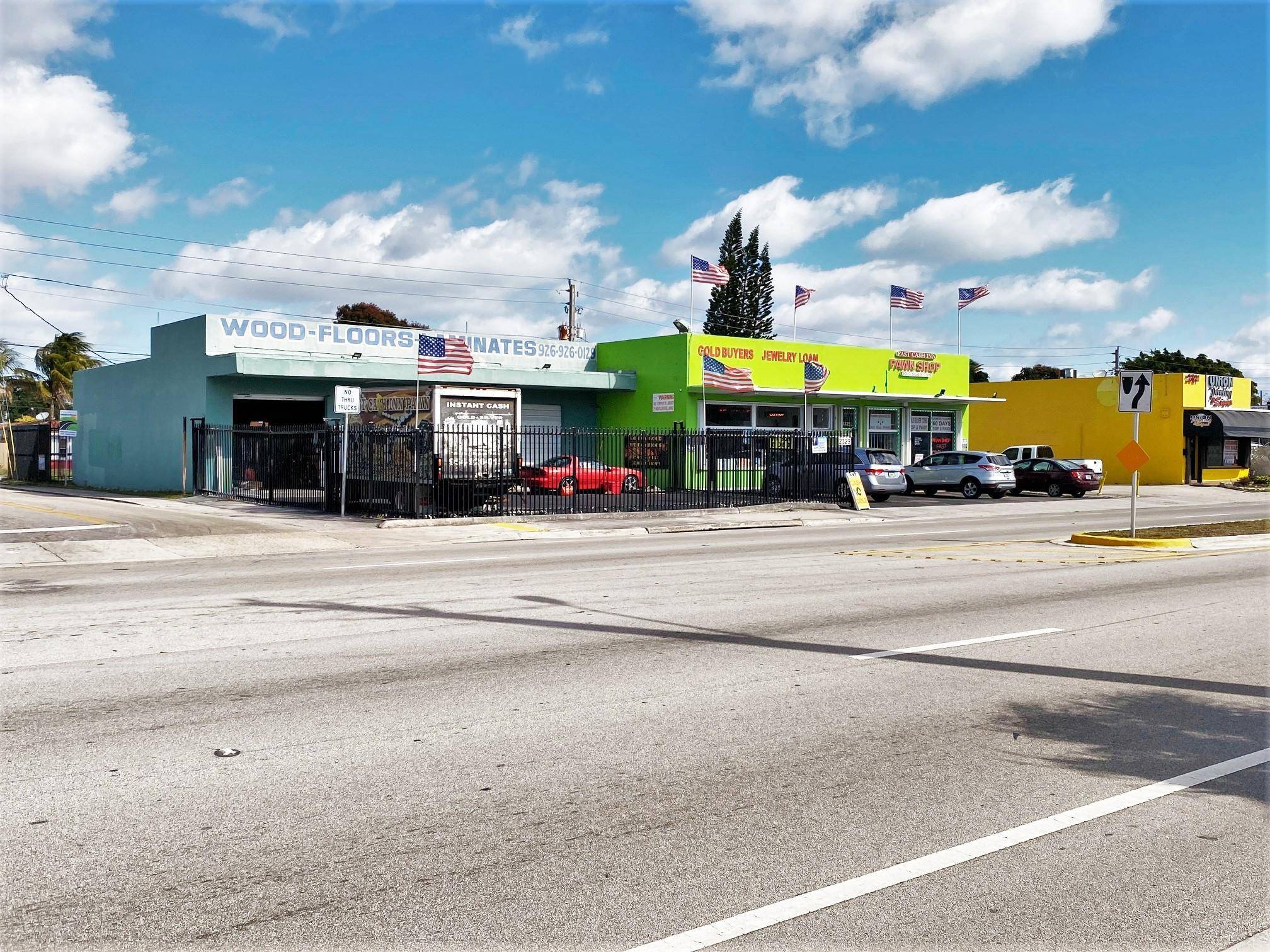 Being sold complete ! Two semi attached Concrete Block buildings with stucco on heavy traffic divided street.