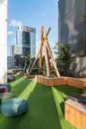 View of playground with a city view