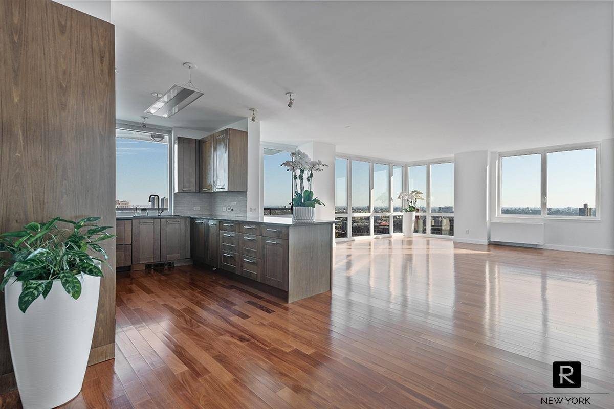 WOW ! Wrapped in floor to ceiling windows, this modern and expansive corner 2 bedroom 2.