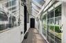 Covered walkway from garage to the house from the back
