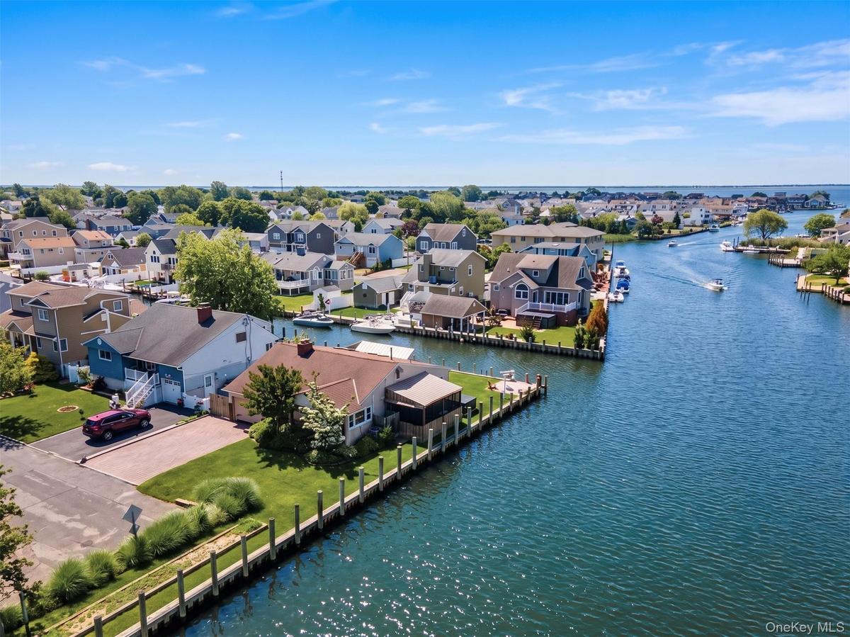 Waterfront property featuring extensive canal frontage with boat docks