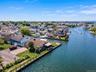 Waterfront property featuring extensive canal frontage with boat docks