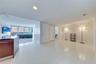 This area is a den area off the kitchen. It could be closed off, it shares a bathroom with the guest bedroom on the opposite side. Windows have protec