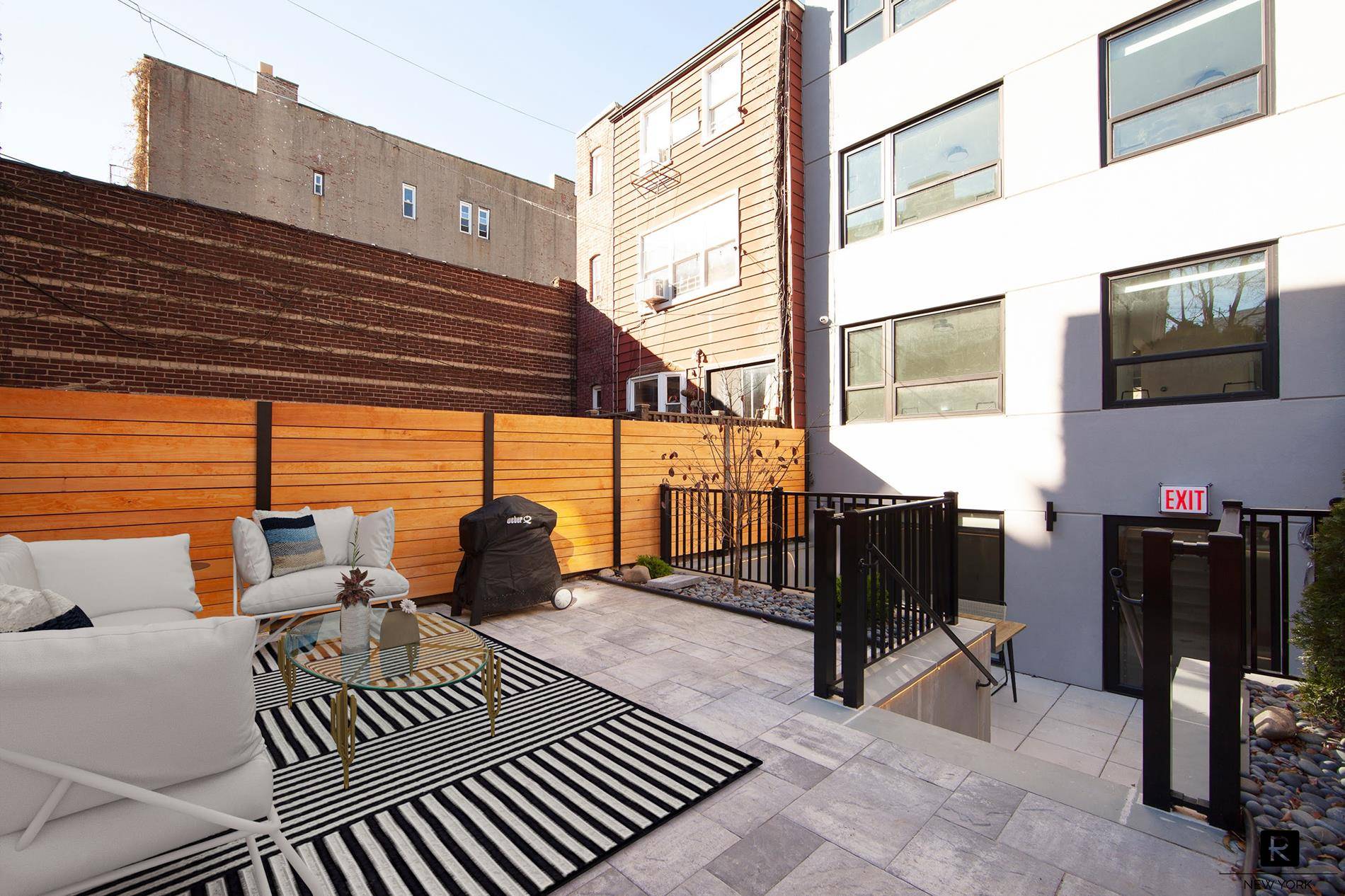 This apartment has 2 Private Outdoor Spaces with Weber Grill, custom LED Lighting and top rated Landscaping !
