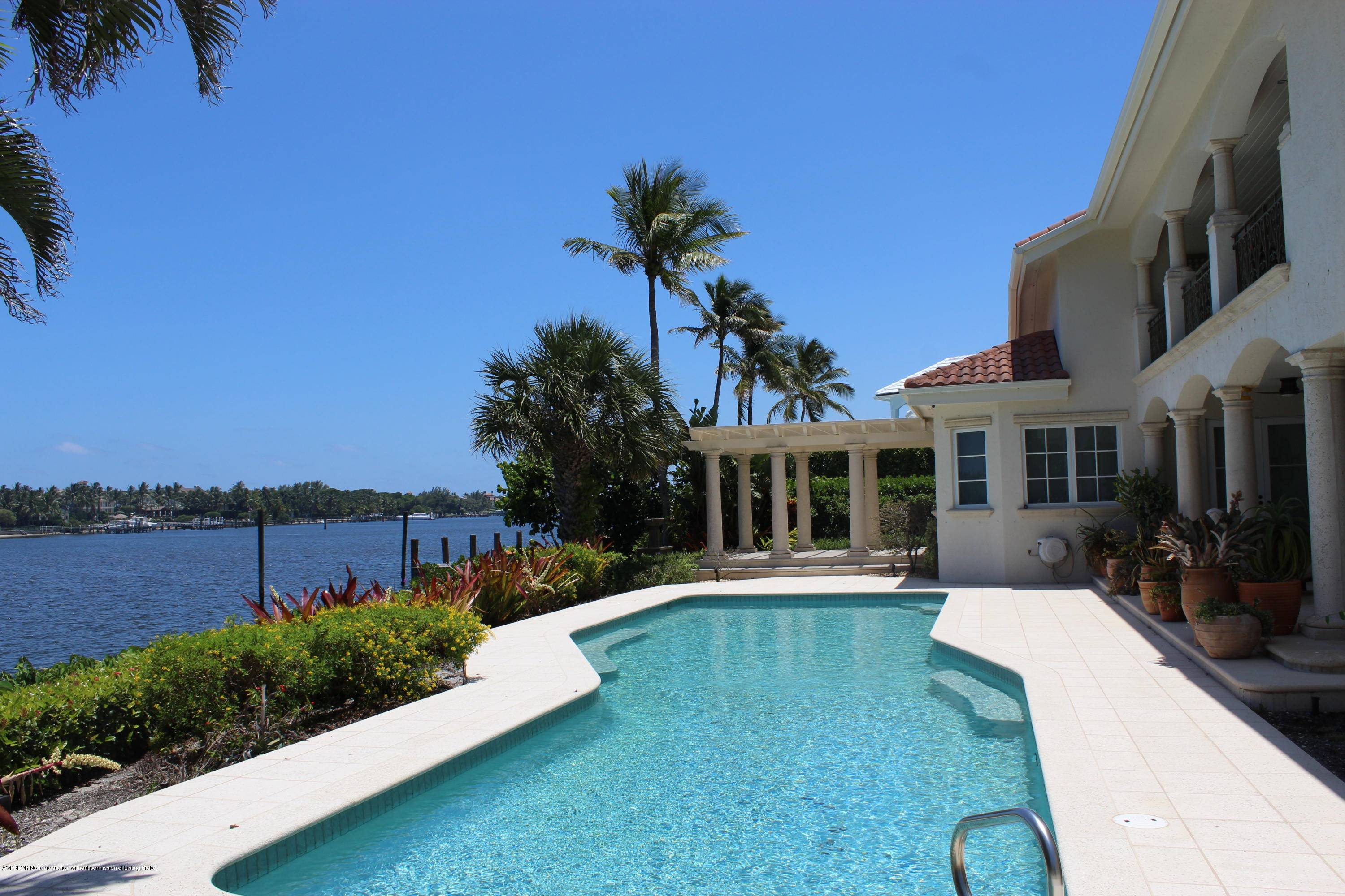 Amazing waterfront estate, a serene oasis right on the Intracoastal on a double lot with wide open water views.
