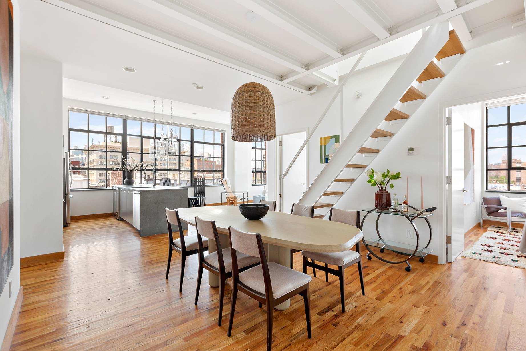 Boasting envious views and thoughtful upgrades, this corner three bedroom penthouse is a perfect blend of industrial style and modern comfort.