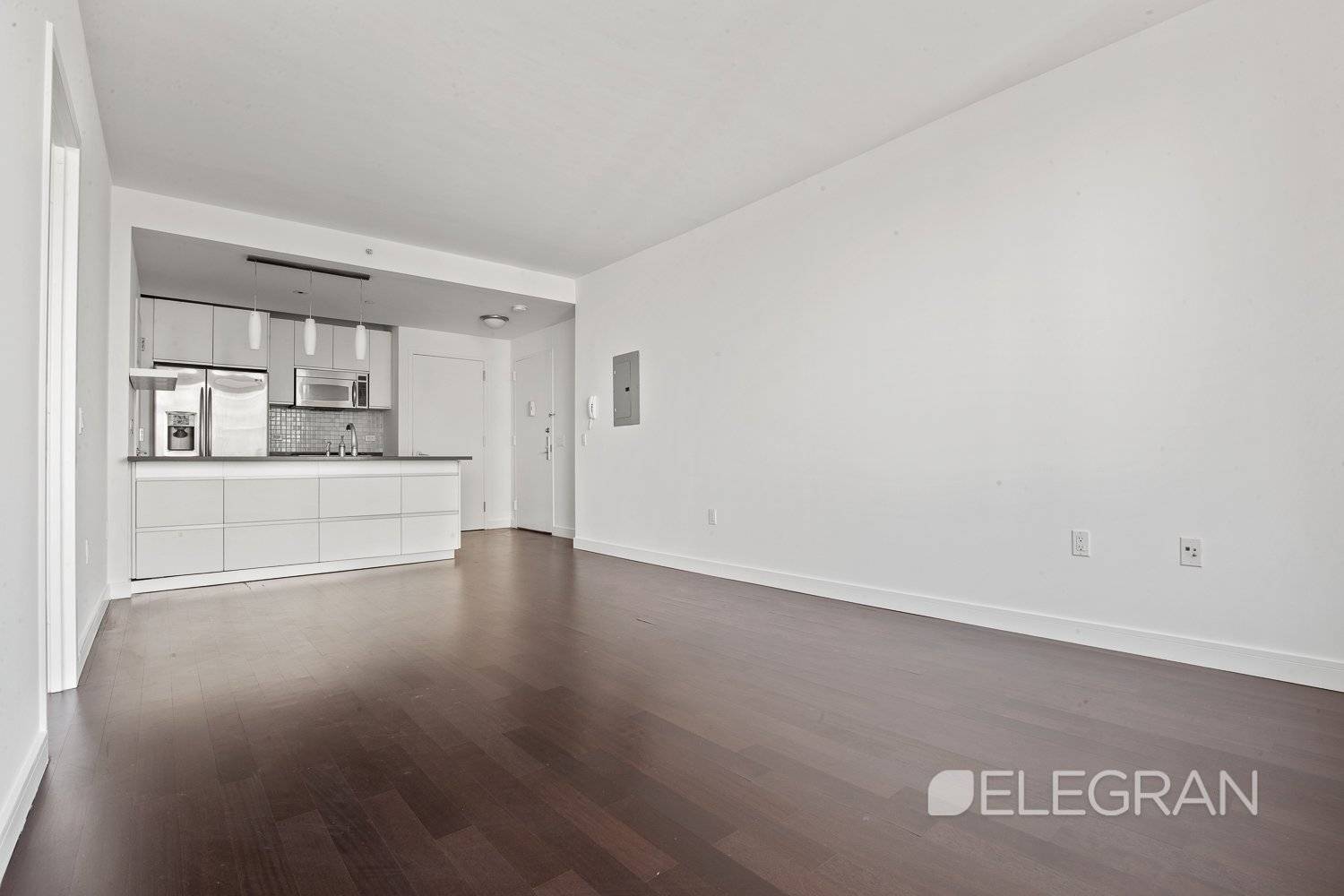This spacious and bright one bedroom apartment soars over downtown Brooklyn, offering a magnificent Eastern view of the Williamsburg Bridge and Fort Greene Park.