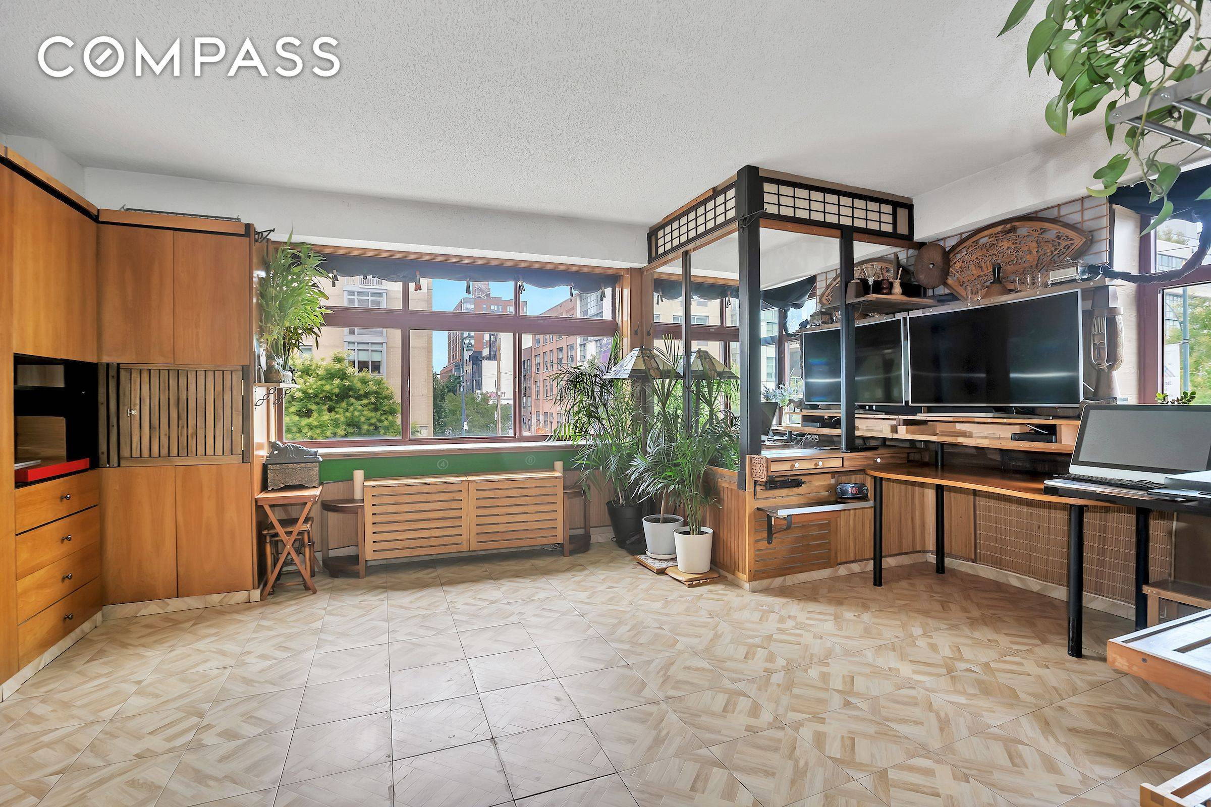 You will be transported to another place in this Far East styled fully customized Studio that feels like a Zen Garden.