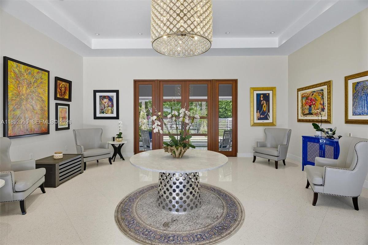 Great room virtually staged as Living and dining room