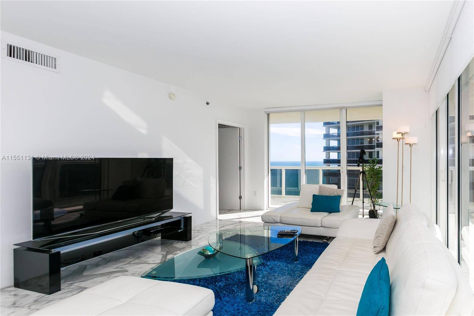 This exquisite corner unit boasts captivating South East Ocean and Intracoastal views.