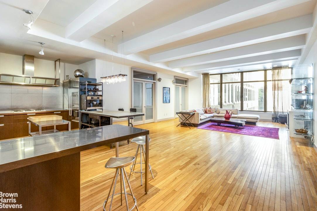At approximately 2269 square feet, this 1 bedroom, 2 bath condo with a home office in the Chelsea Mercantile offers spacious loft living in the heart of Chelsea.
