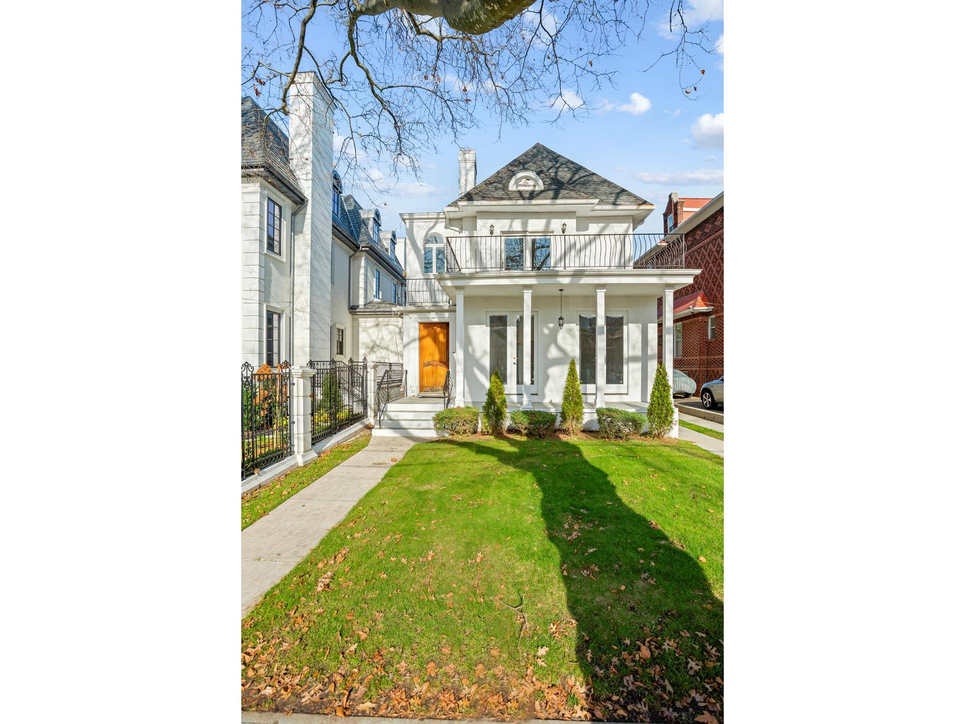 This amazing detached white stucco home sits on the best block in Bay Ridge, Brooklyn and has been a mainstay of the neighborhood since 1920 when it was built.