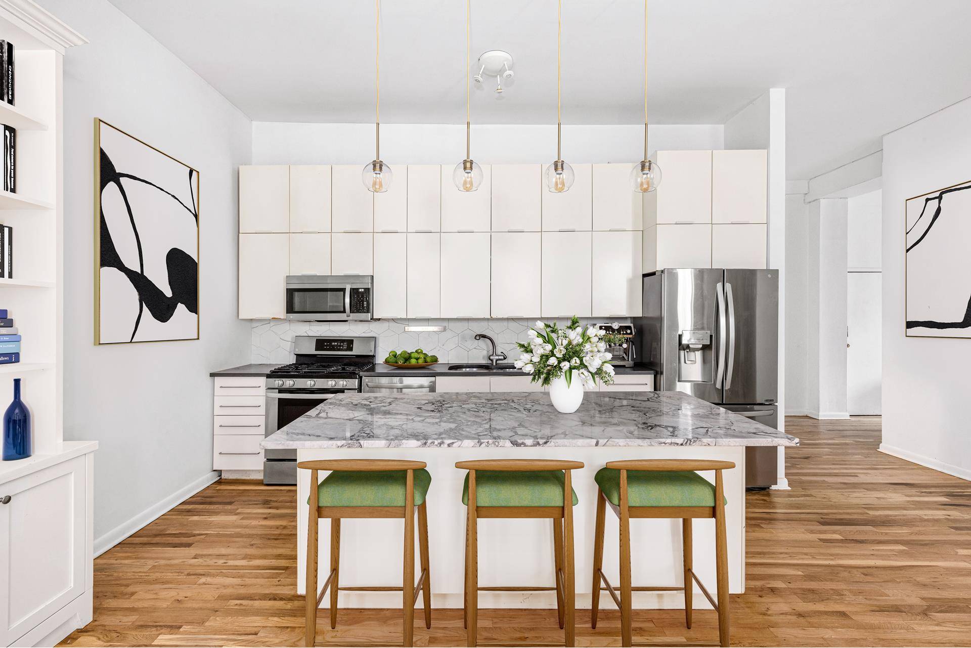 Stepping into the 1, 535 square foot home, this three bed two bath charming loft greets you with soaring 12' ceilings and a layout perfect for entertaining.