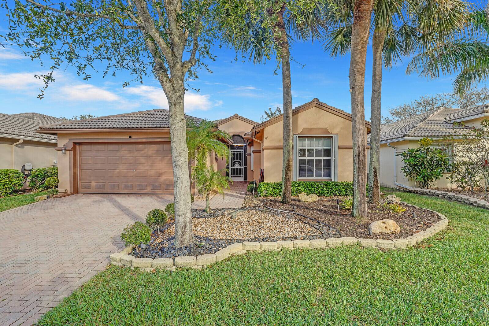 This beautiful 4BR 2BA Napoli model is nestled in the highly coveted Venetian Isles, a premier active adult community in Boynton Beach.