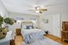 Bedroom featuring ceiling fan and light wood-style flooring