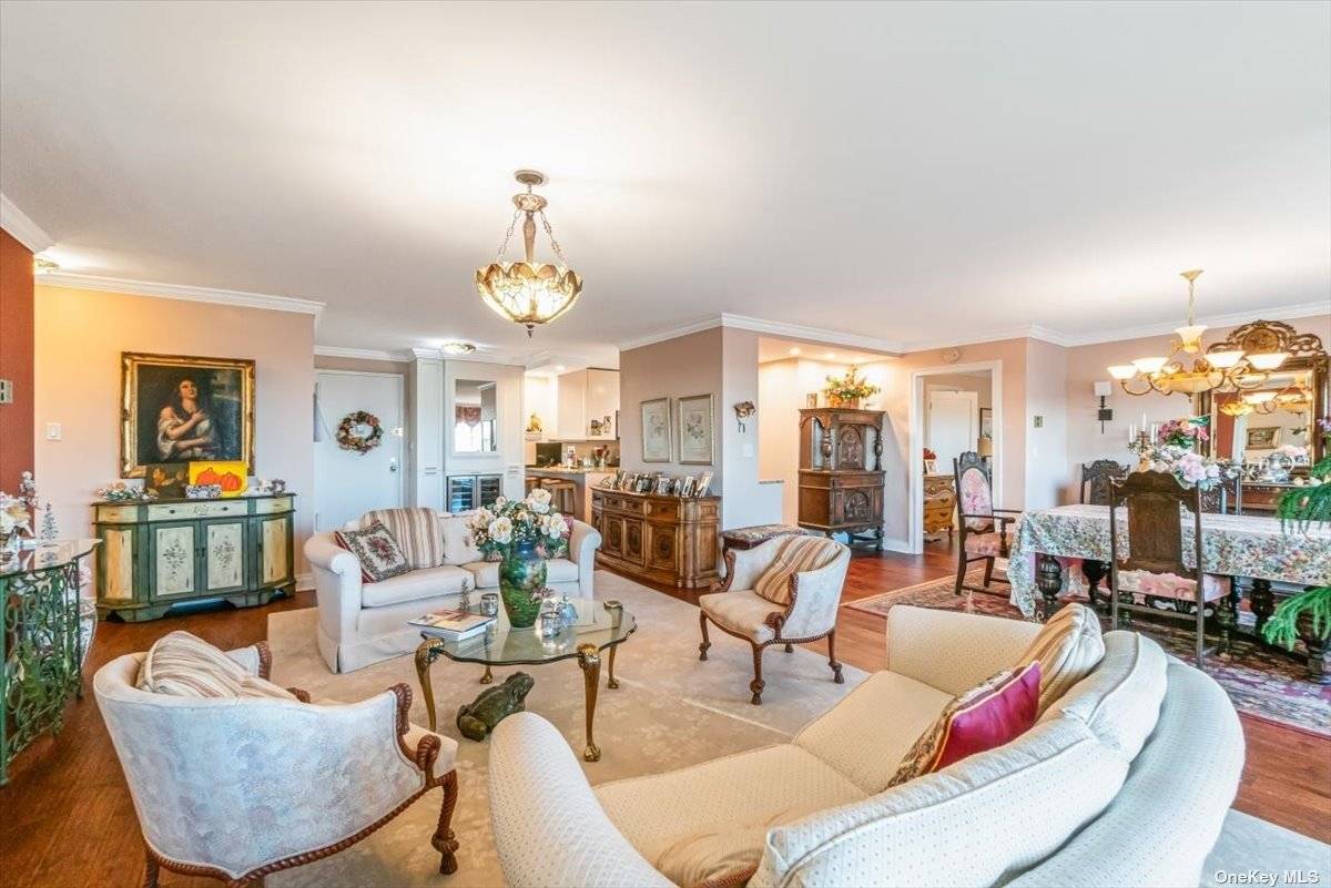 One of a kind ! Two apartments combined into one amazing living space with South facing exposure overlooking Little Neck Bay from 2 private terraces W full water views.