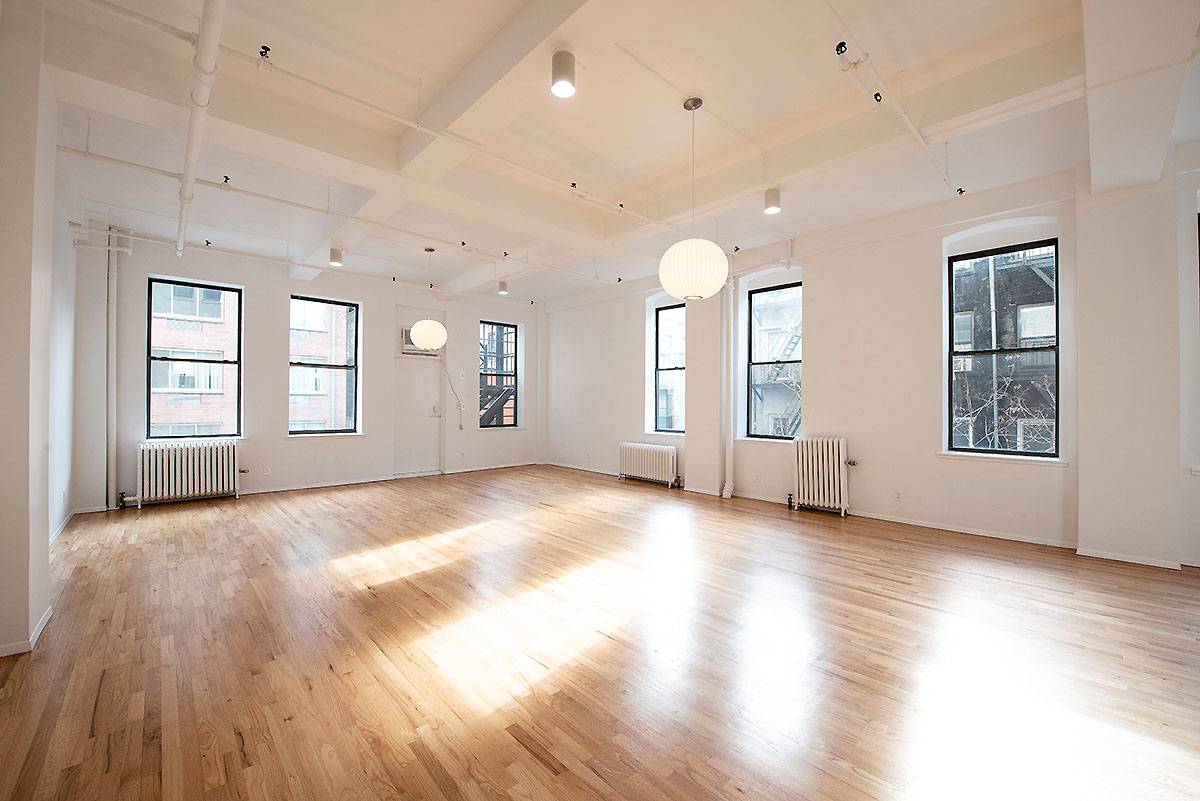 Large beautiful open loft located in prime Soho location at Spring and Lafayette Streets.