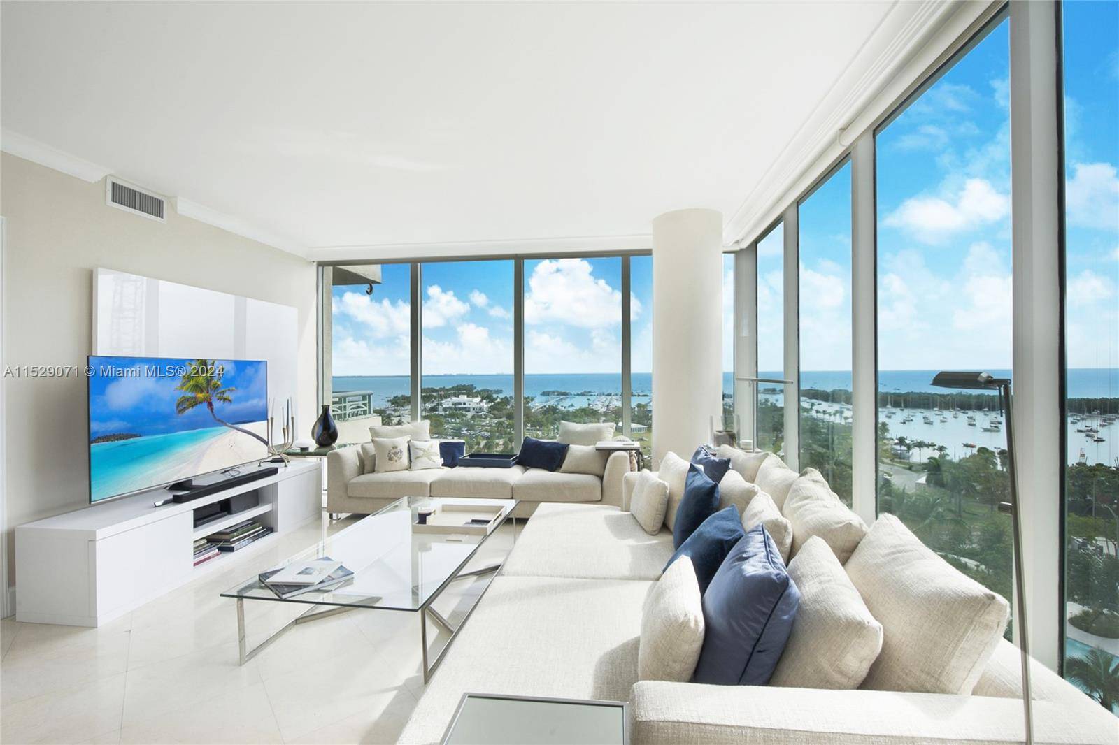 Fully furnished rental with direct unobstructed waterfront views from the floor to ceiling windows and private terraces of this coveted 03 line corner unit at the Ritz Carlton residences in ...