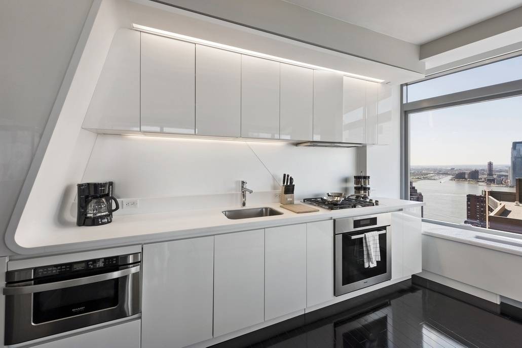 This one of a kind corner 2 bed, 2 bath unit is perched high above the Residences at the W Hotel surrounded by some of New York s prestigious and ...
