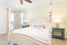 Coastal inspired bedroom design in Margaritaville Orlando short term rental property