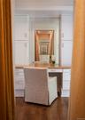 Bathroom with dark wood-style floors and ornamental molding
