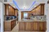 Matching earth tones, and stainless steel reflect clean symmetry and style
