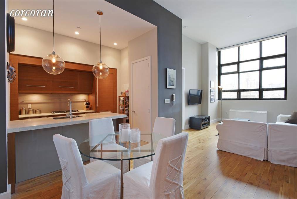 Welcome to Unit 706, a fabulous designer one bedroom condo loft home with 13' soaring ceilings.