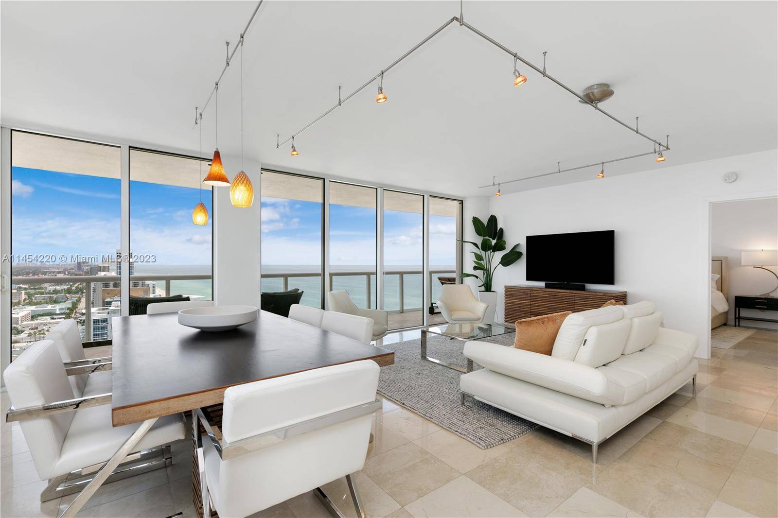 This two bedroom, two bathroom apartment boasts a breathtaking 270 degree view of both the ocean and the city.