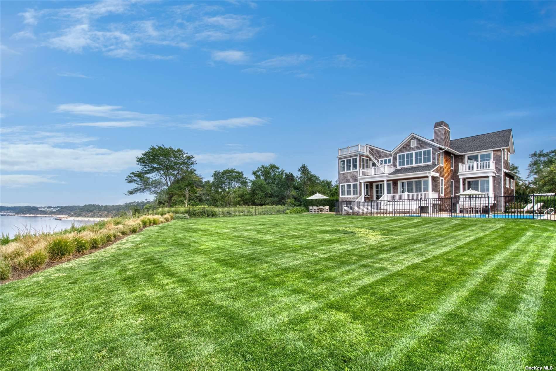 Immaculate shingle style home perched above long island sound.